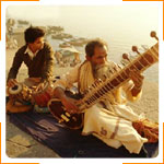 Musicians playing the Sitar and Tabla on the banks of the River Ganga, Varanasi